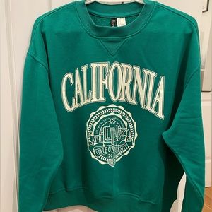 Green H&M sweatshirt